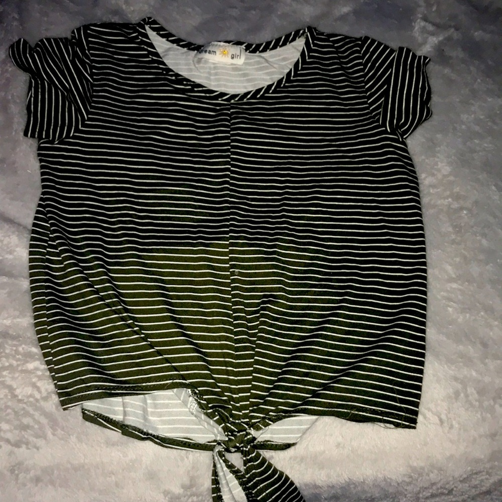 A crop top Army green shirt with knot at end.